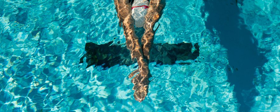 high-angle-male-swimmer-water-pool (1).jpg