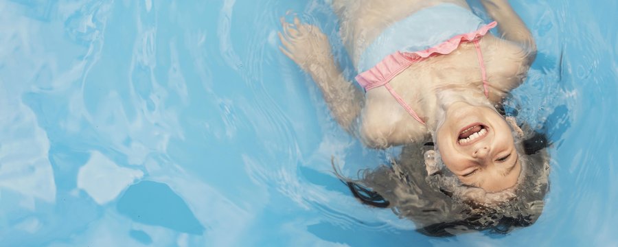 medium-shot-happy-girl-pool